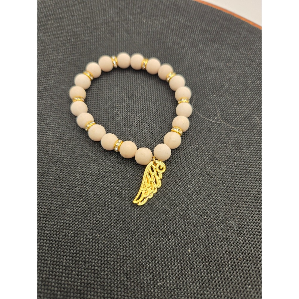 Cream Matte Bead Stretch Bracelet Goldtone Angel Wing Charm Rhinestone Accents